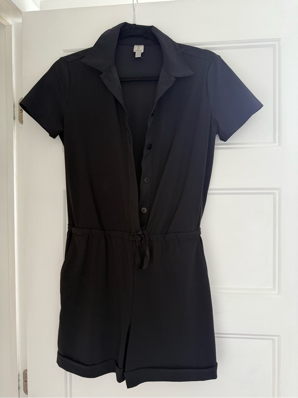 Tristan Black Short-Sleeve Button Romper with Drawstring Waist